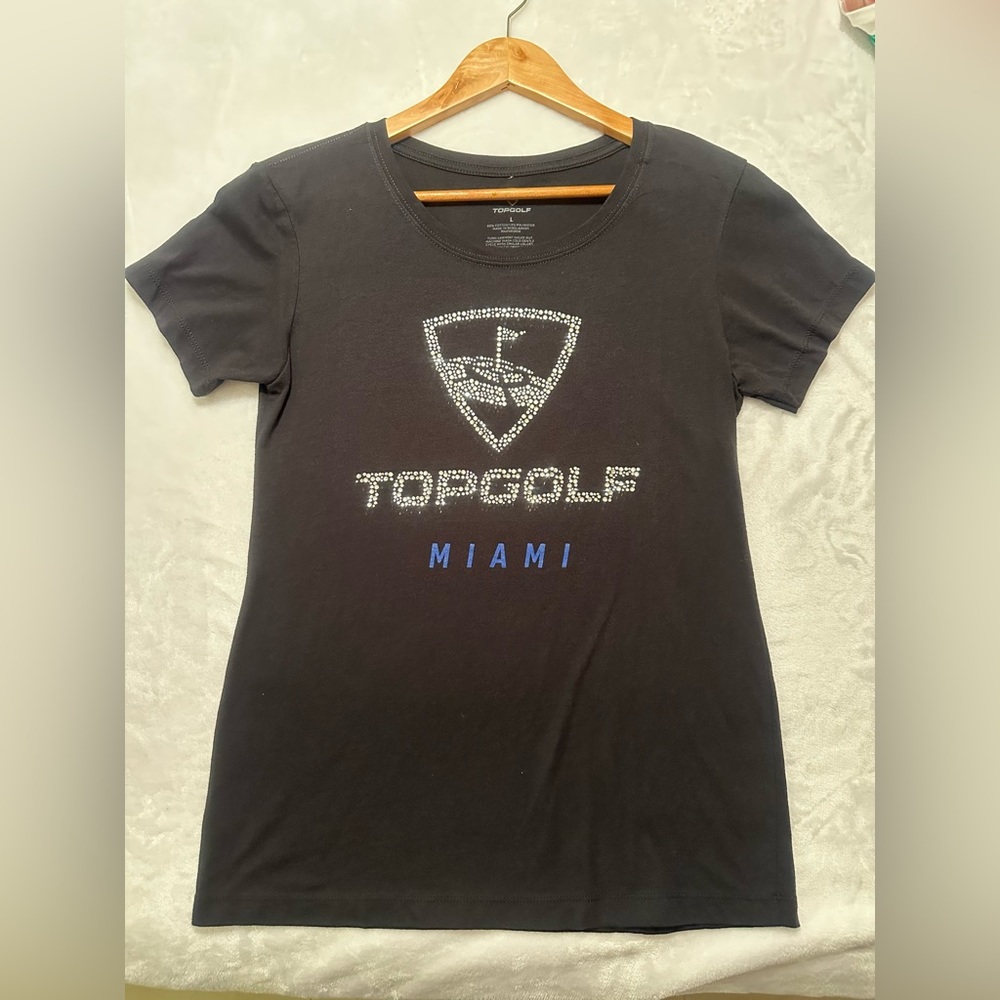 Top Golf Miami women’s large black tshirt. Rhinestone detail. Beautiful bling!